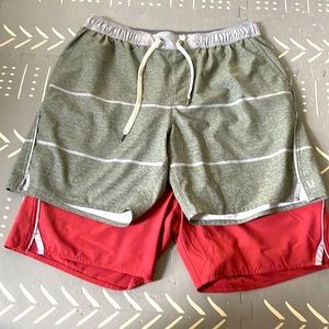 Two Pair of Vuori Men’s Large Trail Shorts.